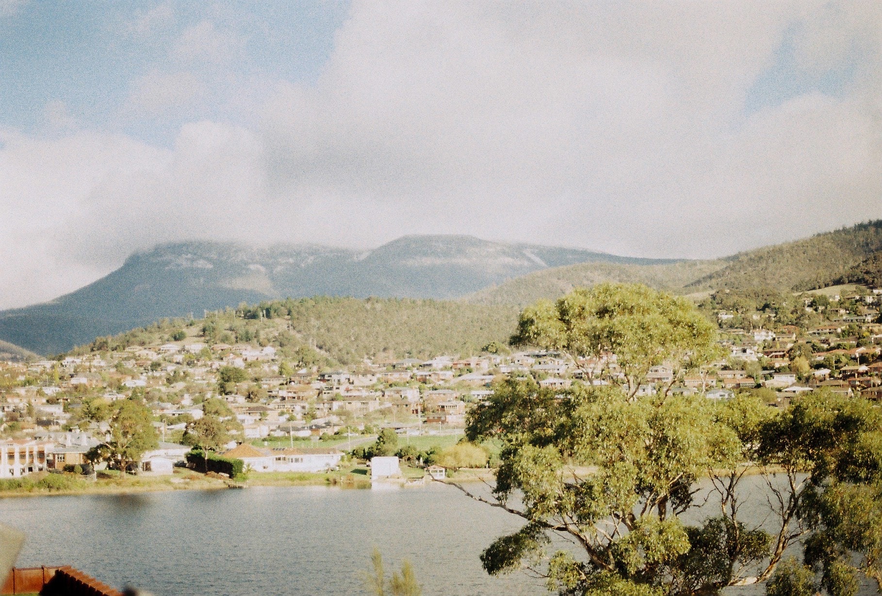 Mountain valley town riverside landscape — photograph by Aleksandar Djeric